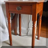 F34. One-drawer nightstand with turned legs. 28”h x 18”w x 18”d 